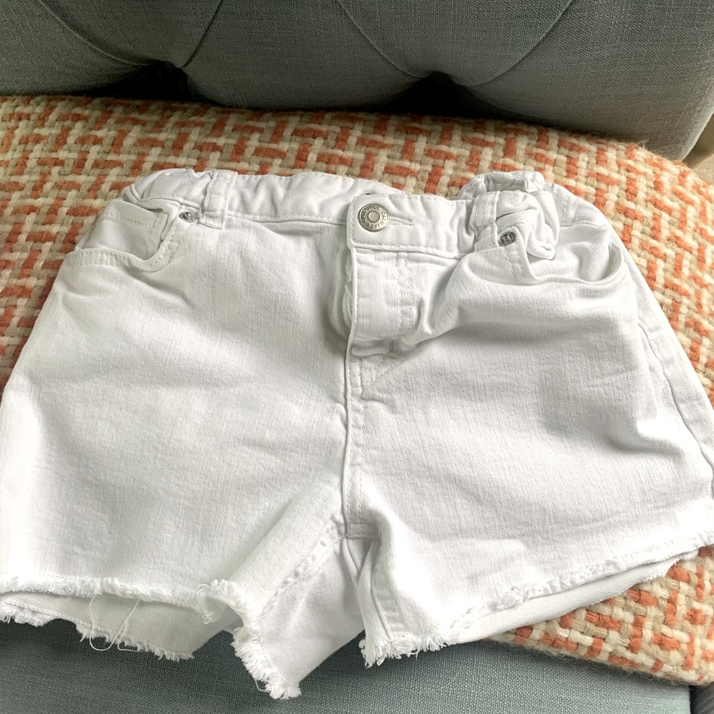 White denim Cat & Jack jean shorts.